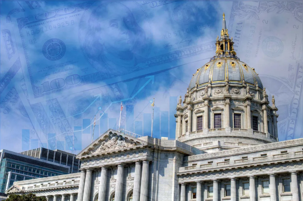 San Francisco City Hall with images of money and charts overlaying on top of it.